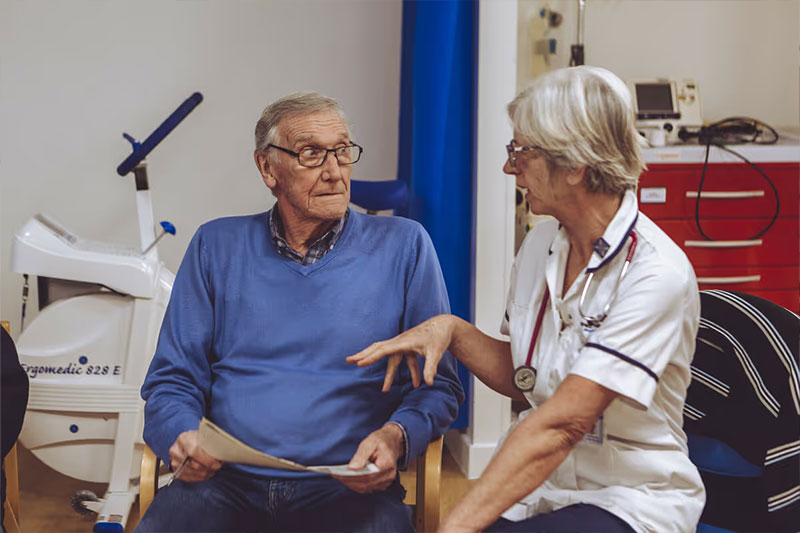 Nurse Explaining to Patient